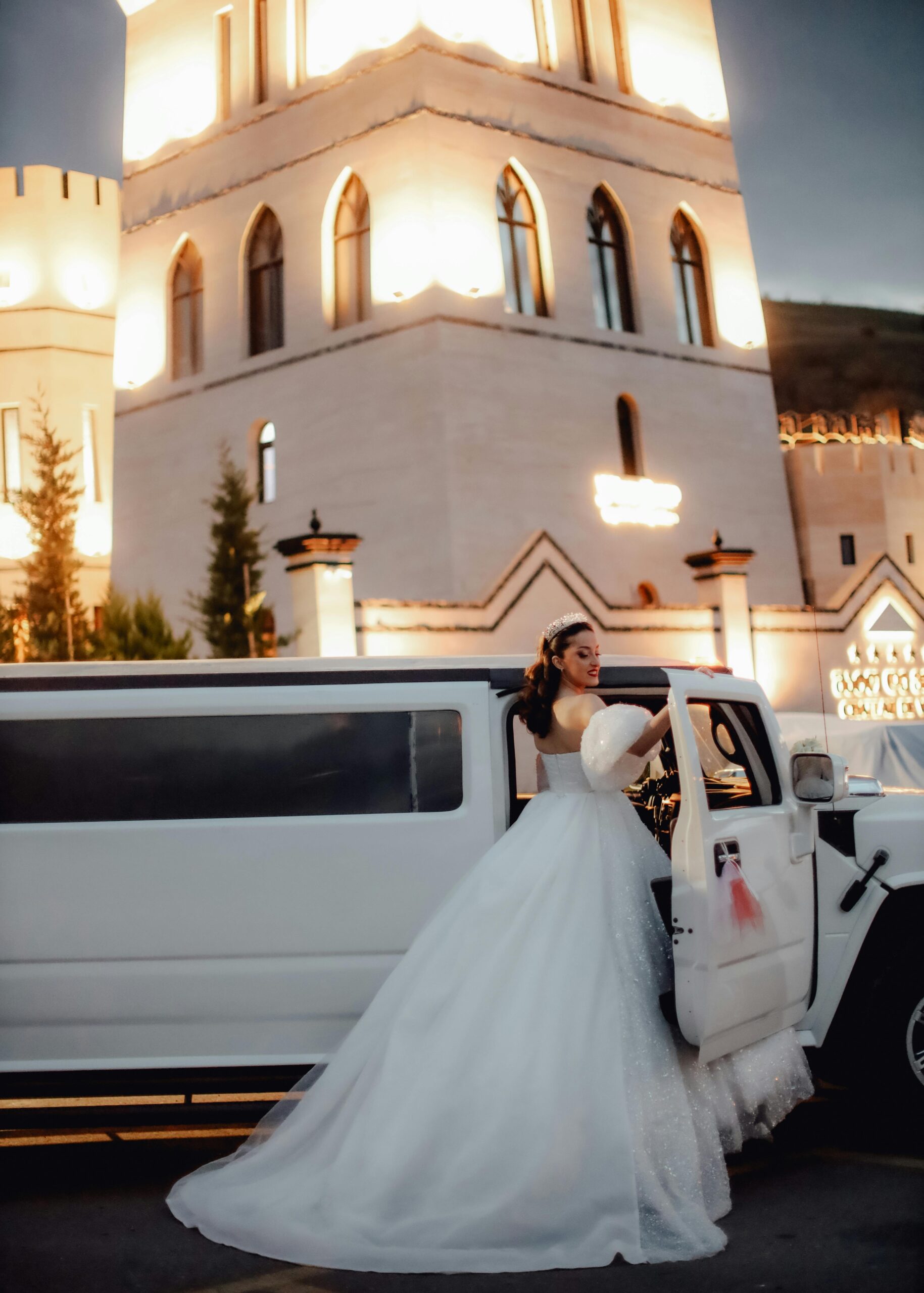 bride in front of her limousine